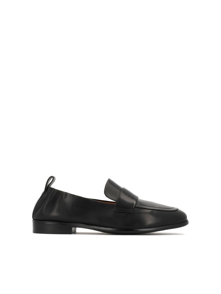 Black slip-on shoes with elastic at the heel