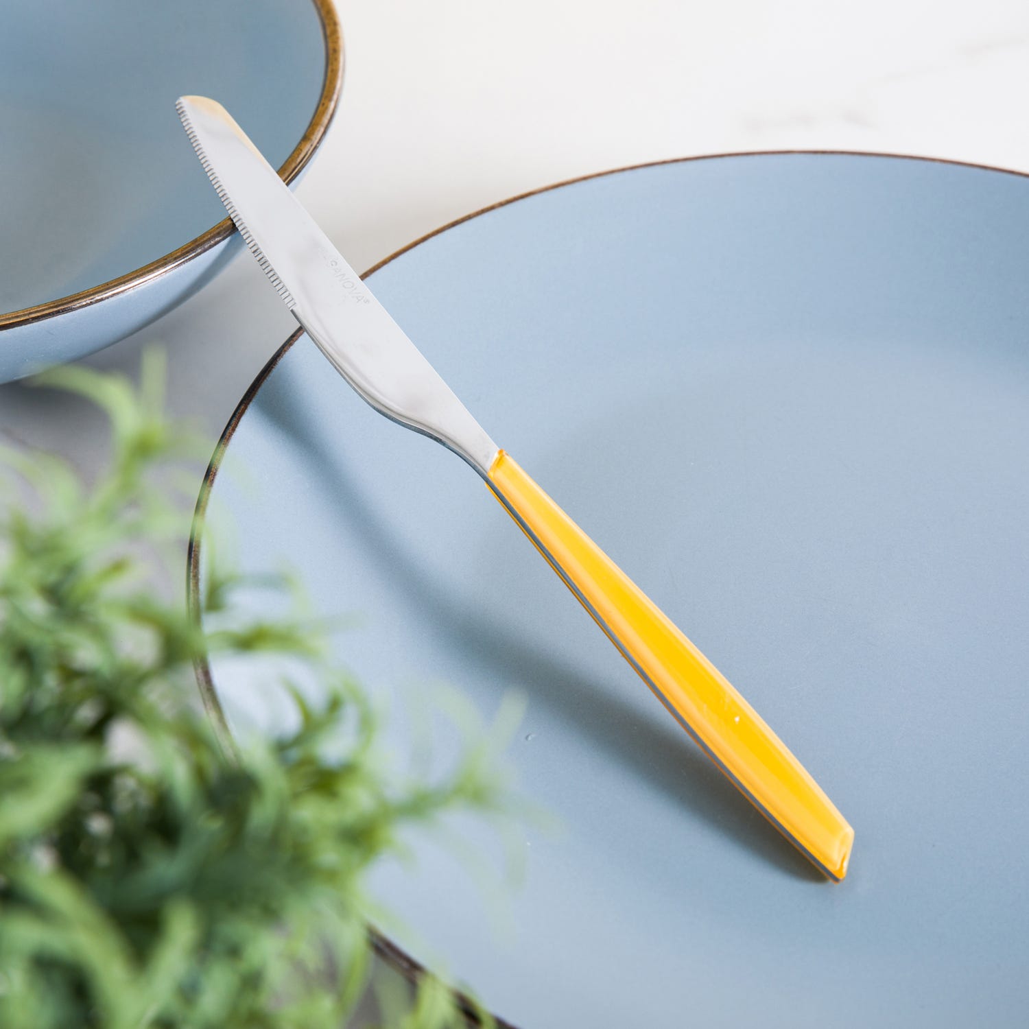 Coltello tavola sfuso giallo in acciaio inox Silhouette