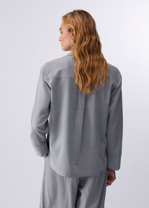 Camicia gessata con borchie