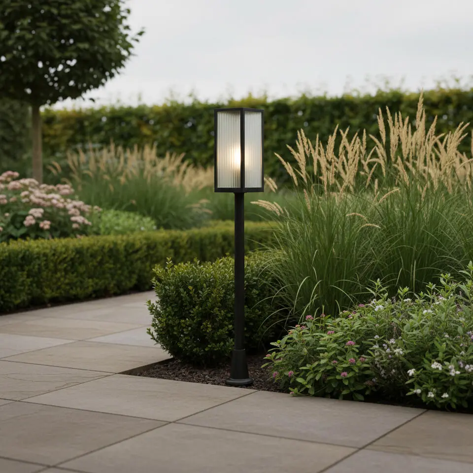 Qazqa wandlamp met bewegingssensor charlois ribbed zwart