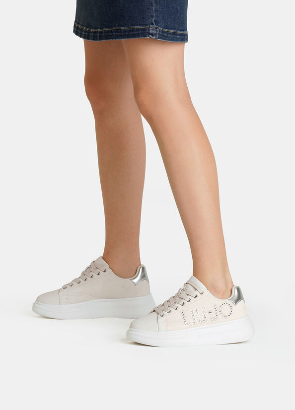 Sneakers con logo gioiello