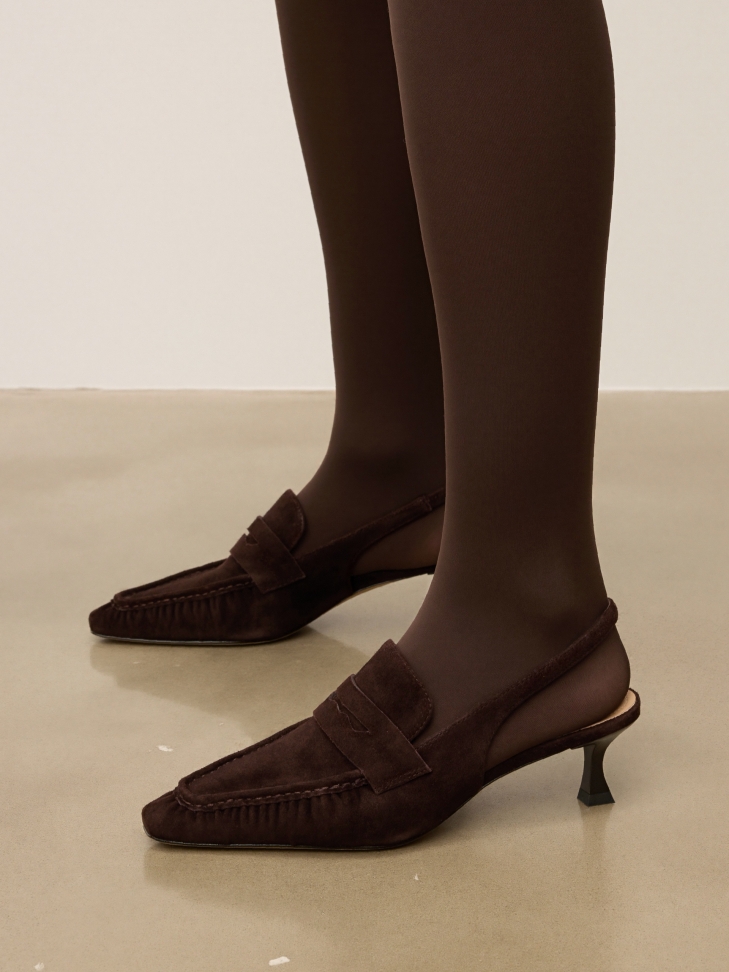 Brown suede pumps with decorative stitching