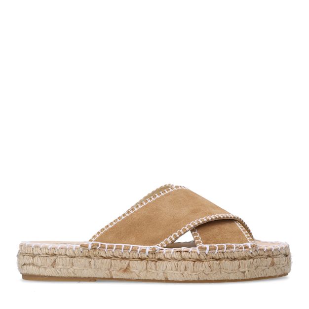 Beige suède slippers met witte stiksels