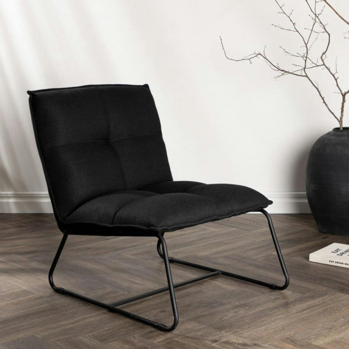 LUPS - Fauteuil en tissu noir matelassé et métal
