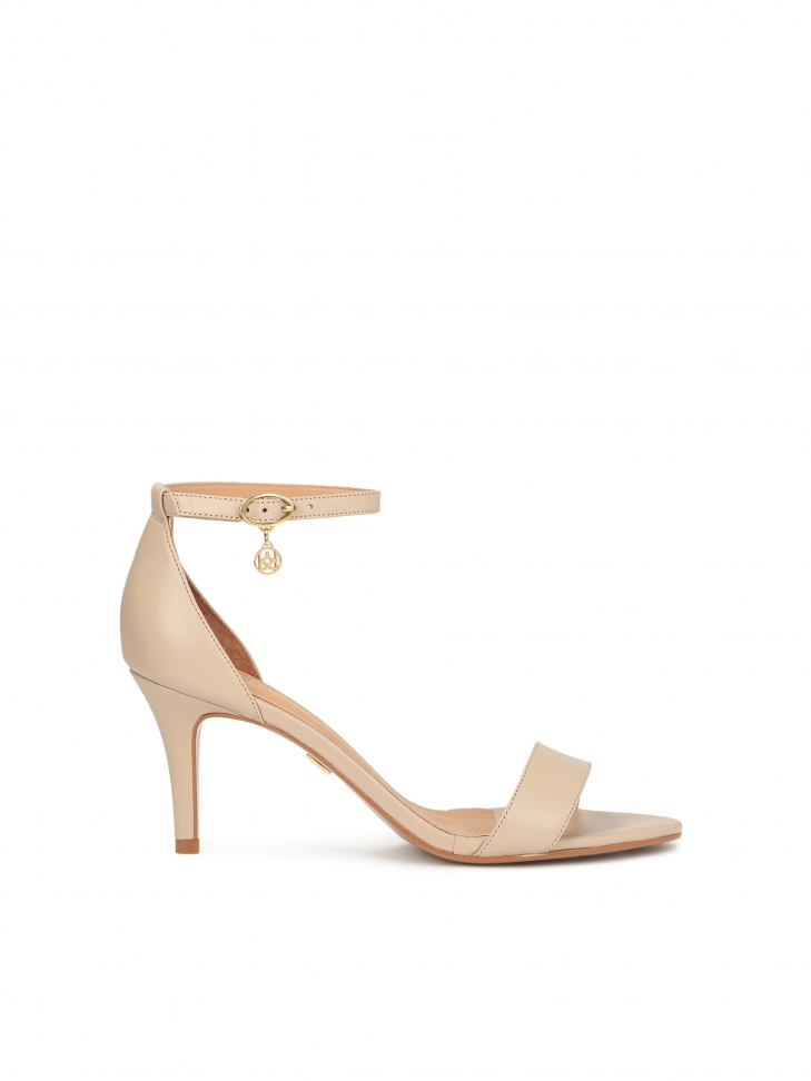 Beige leather sandals with a low stiletto heel