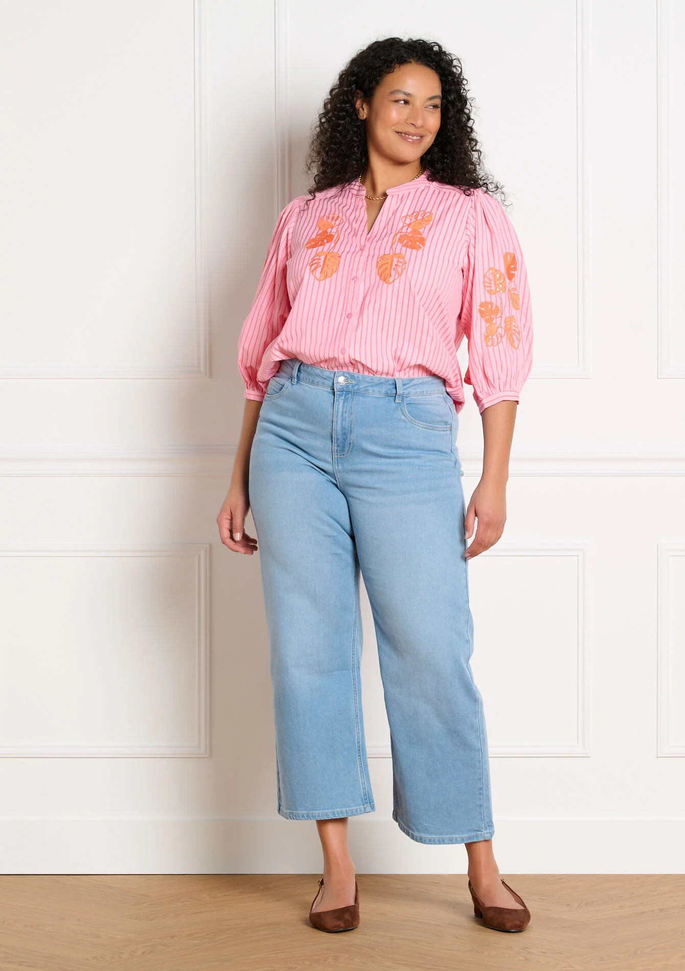 Gestreepte blouse met borduursel