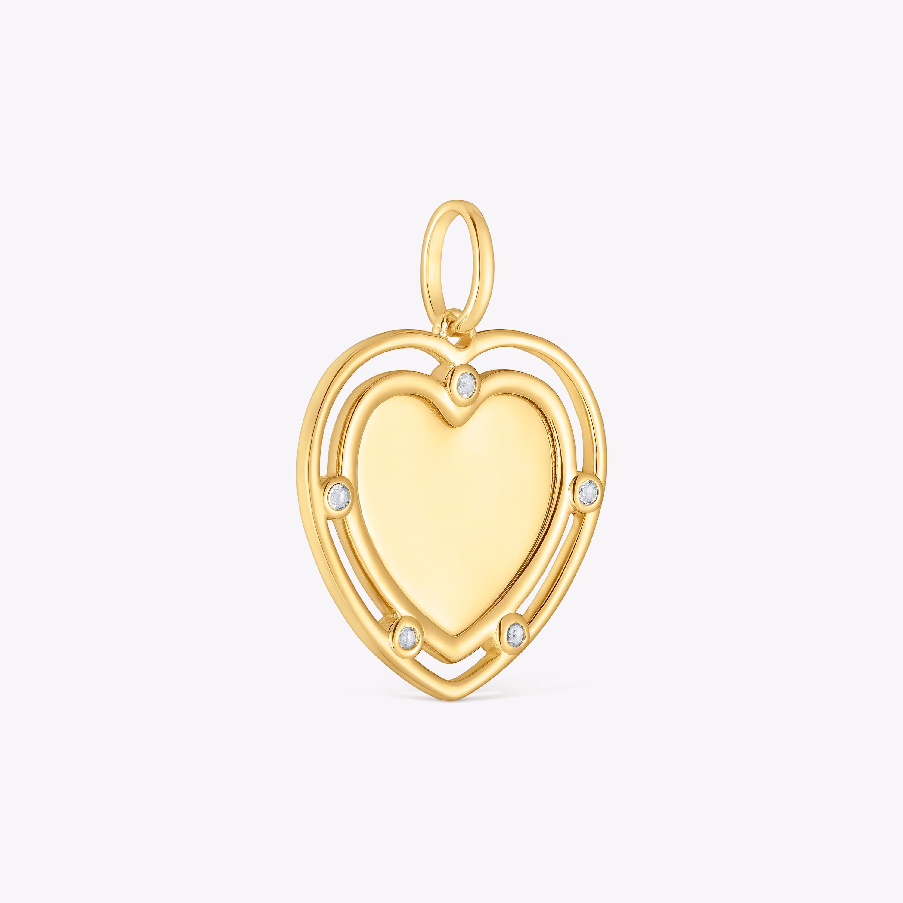 Colgante corazón con baño de oro 18 kt sobre plata y topacios Medallions