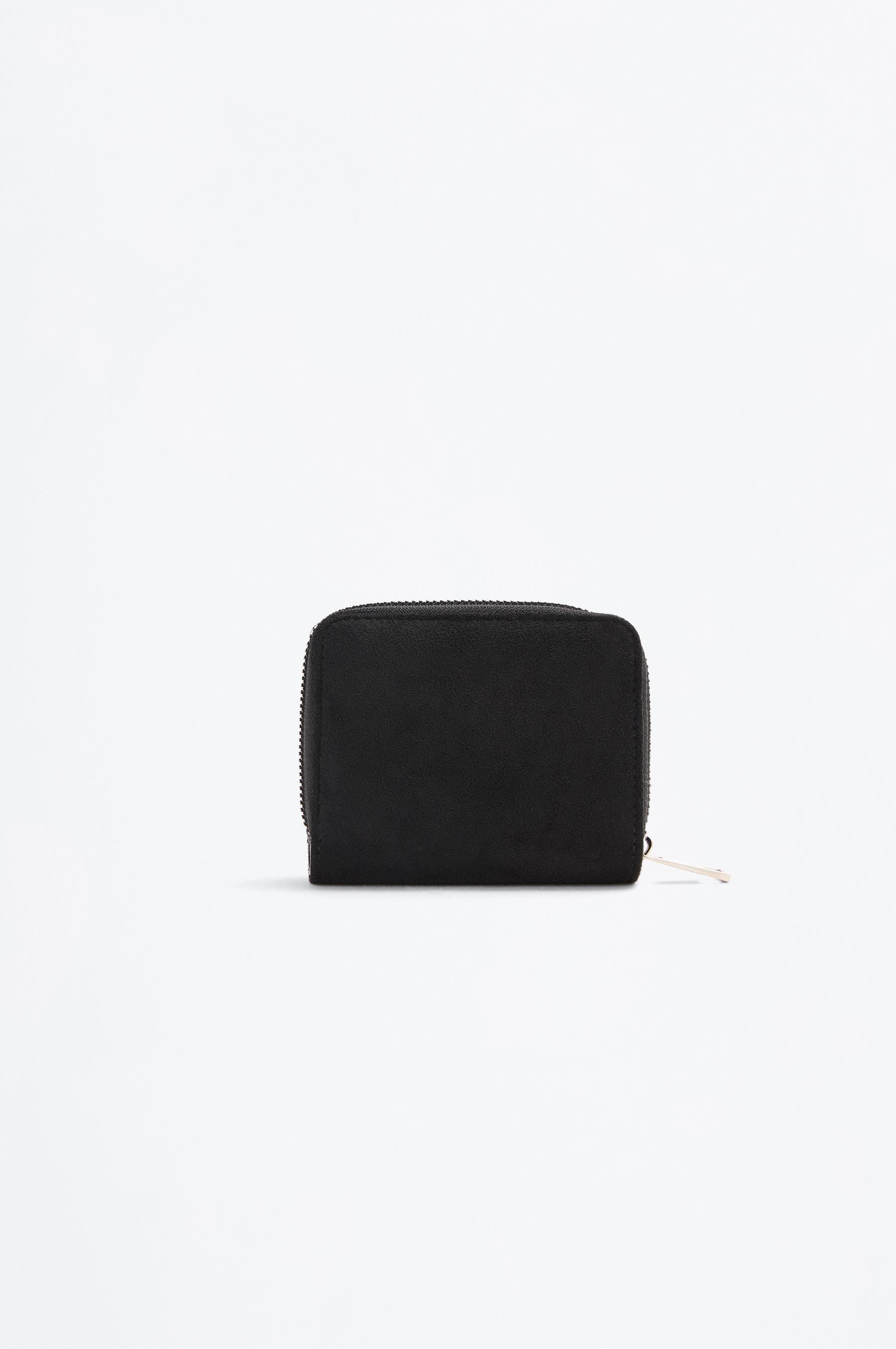 Cartera tachas