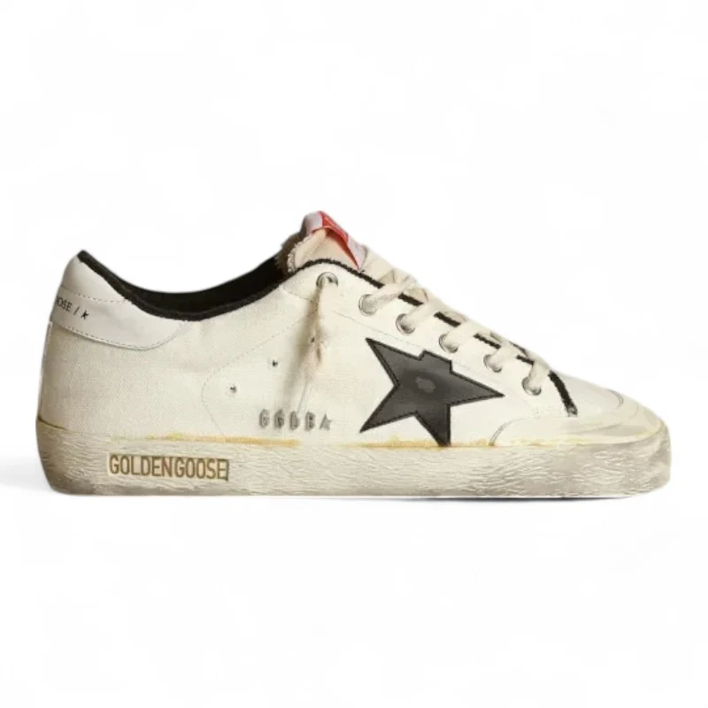 The Super-Star LTD sneakers in beige canvas with a black leather star and white leather heel tab