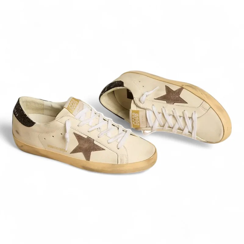 Super-Star LTD sneakers with a laminated leather star and black glitter heel tab