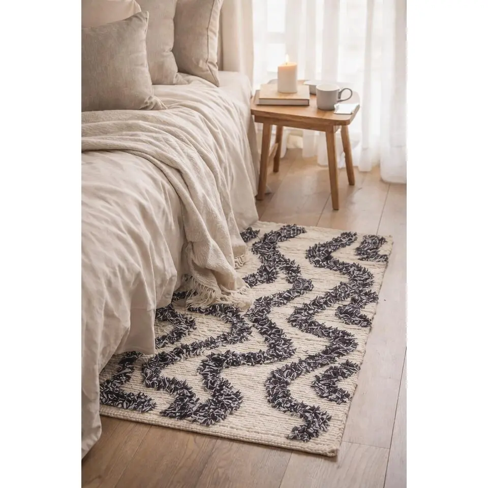 Rechthoekig katoenen tapijt met beige en zwarte motieven 60 x 90 cm