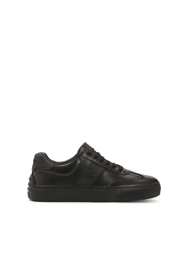 Black leather sneakers with rubber on the heel