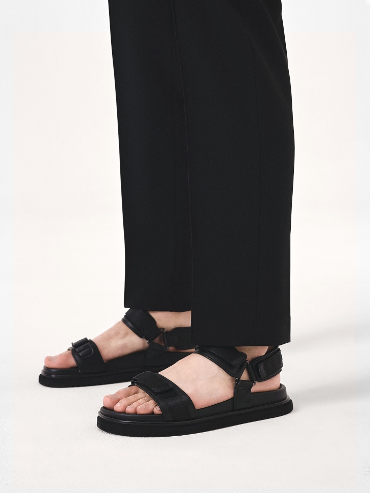 Black leather sandals with velcro straps