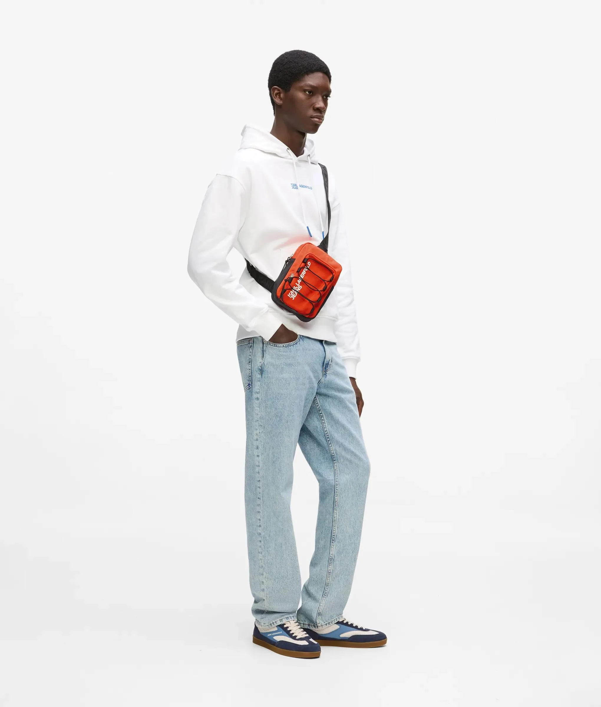 Sac bandoulière de style utilitaire avec cordon de serrage