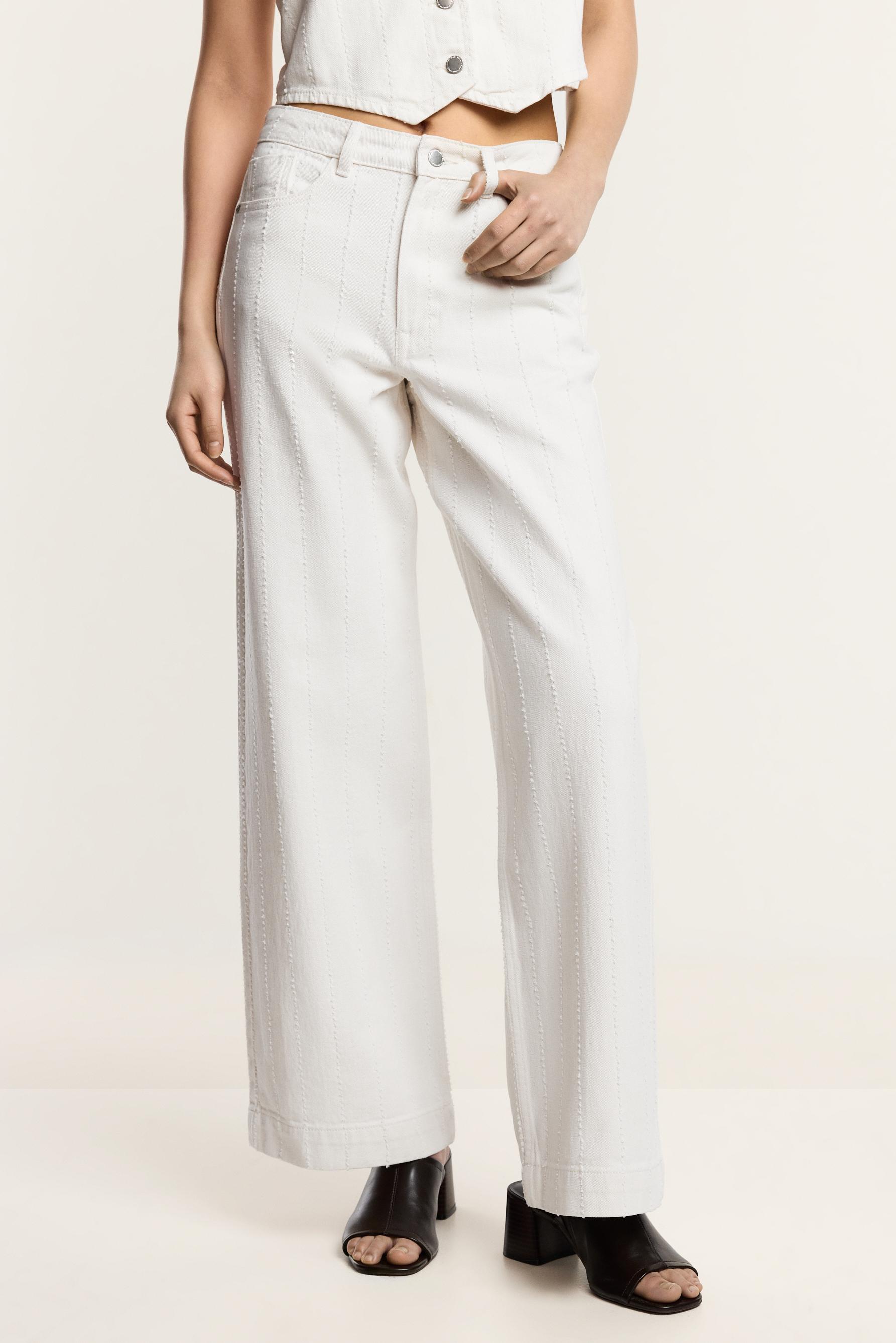 Jeans wide leg pespuntes