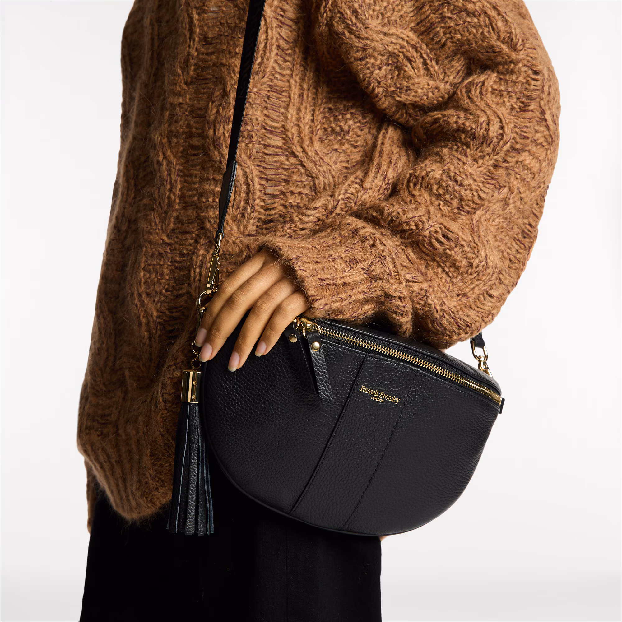 Rotate<br>Curved Crossbody Bag