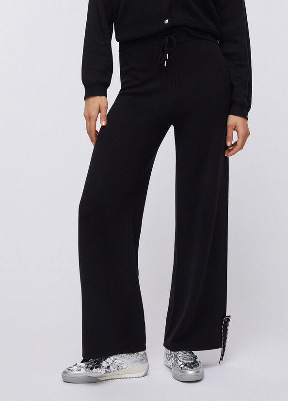 Pantaloni in maglia con perline