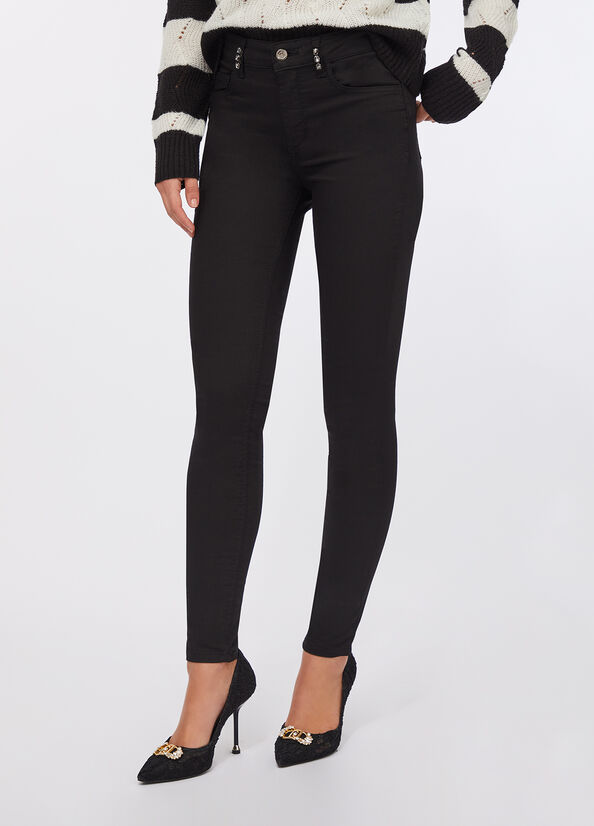 Pantaloni skinny con pietre gioiello