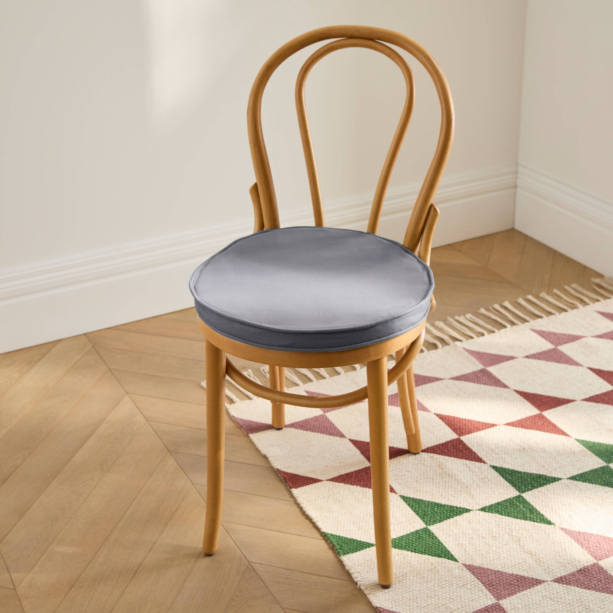 Coussin d'assise uni rond bachette
