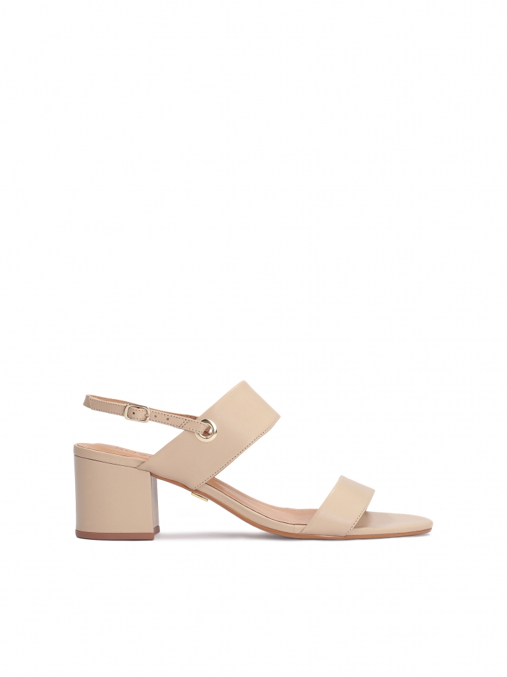Beige leather sandals on a wide heel