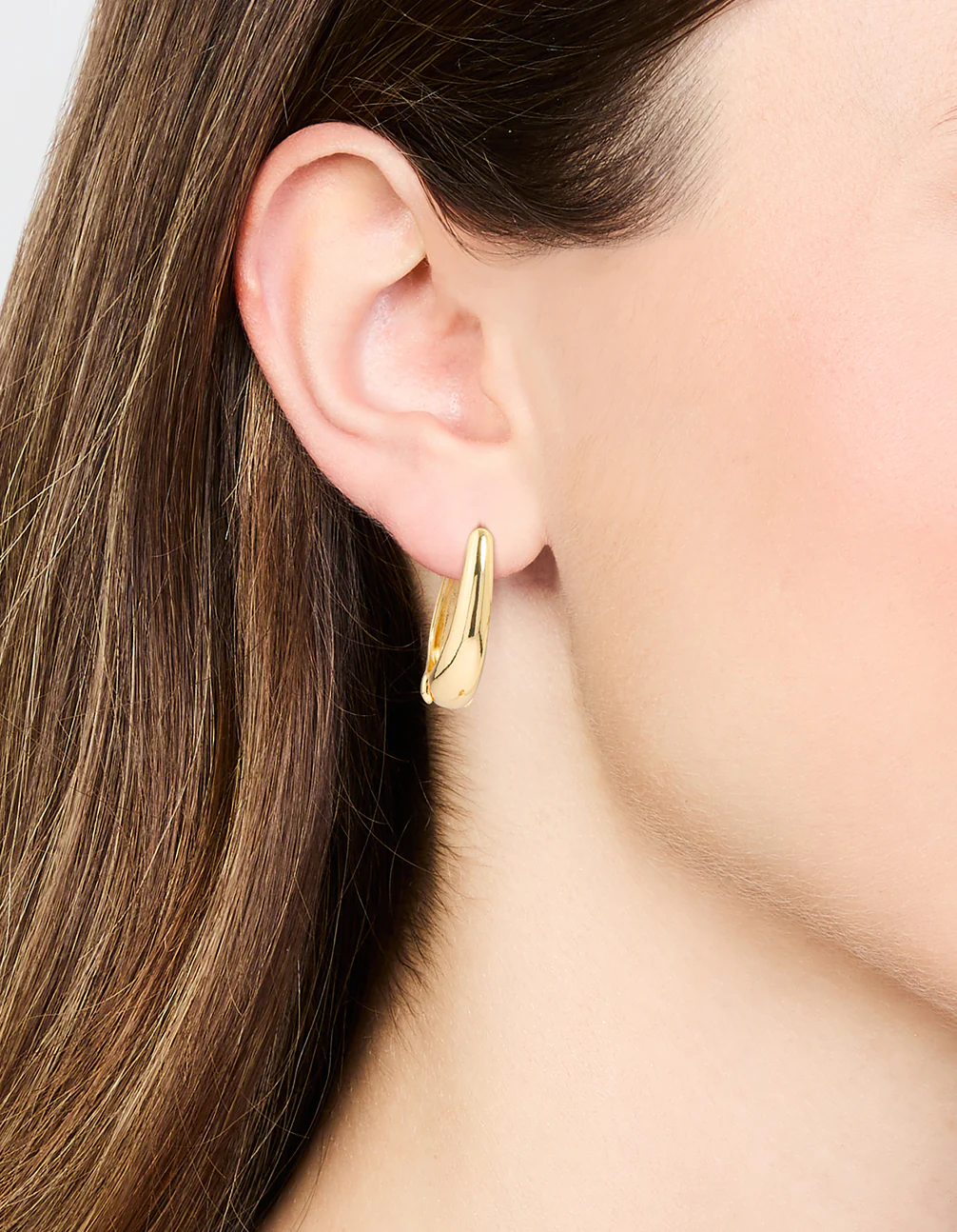 Gold Oval Huggie Earrings