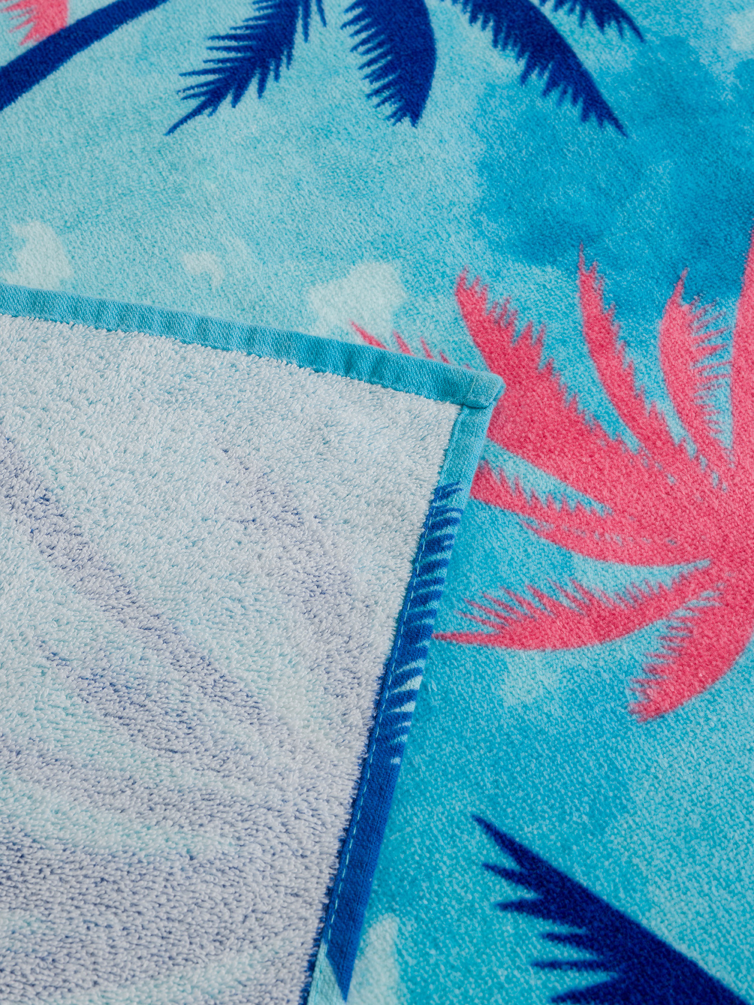 Telo mare in cotone stampa palme
