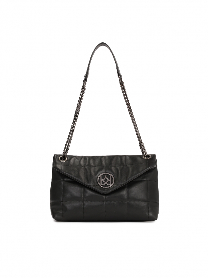 Quilted leather handbag with flap