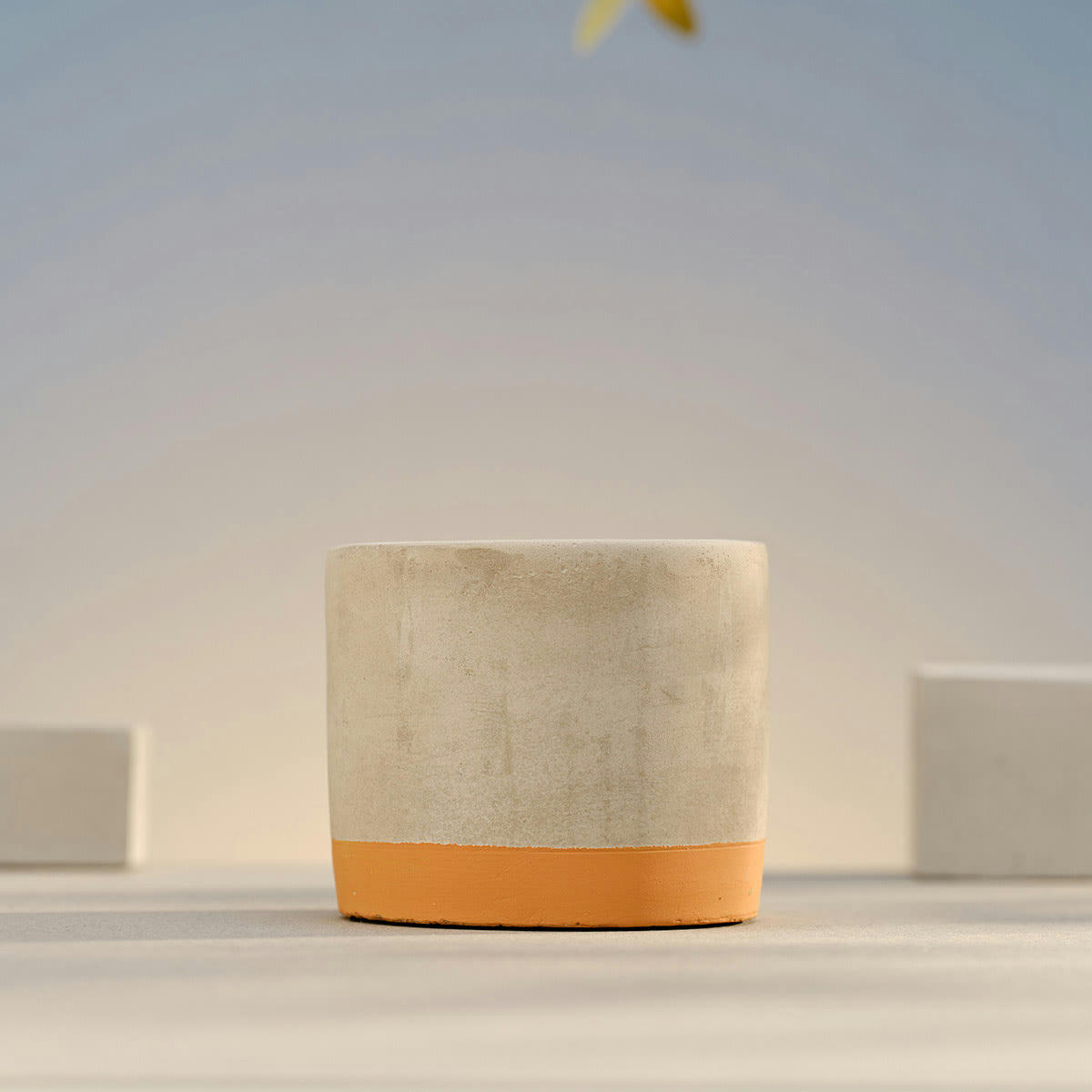 - Bougie extérieur pot béton 180g Oranger Citronnelle