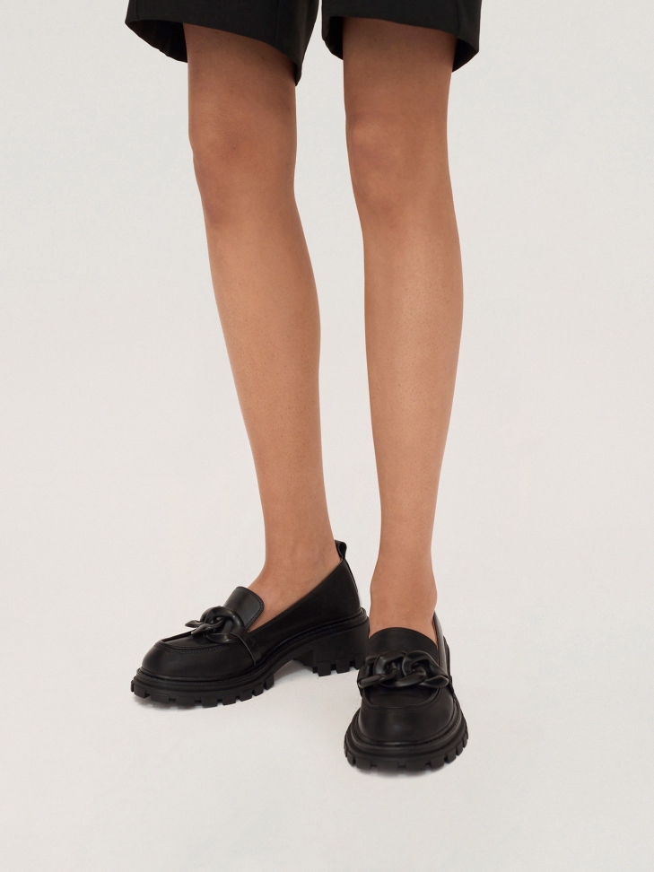 Leather slip-on shoes with a track-type sole