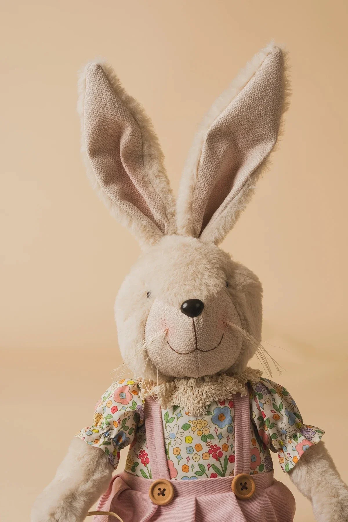 Sitting Ms. Bunny Holding Easter Eggs Basket