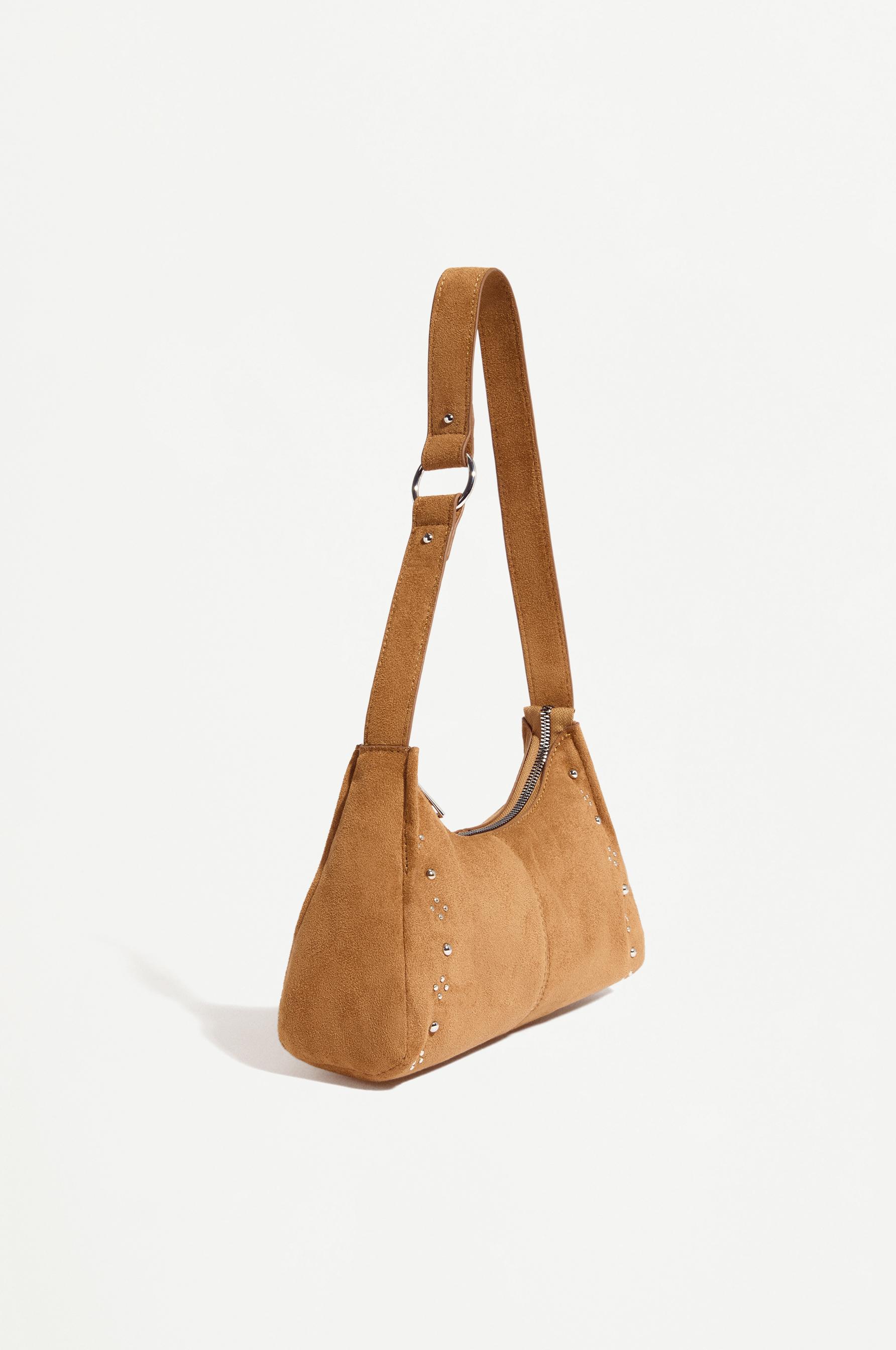 Bolso de hombro tachas