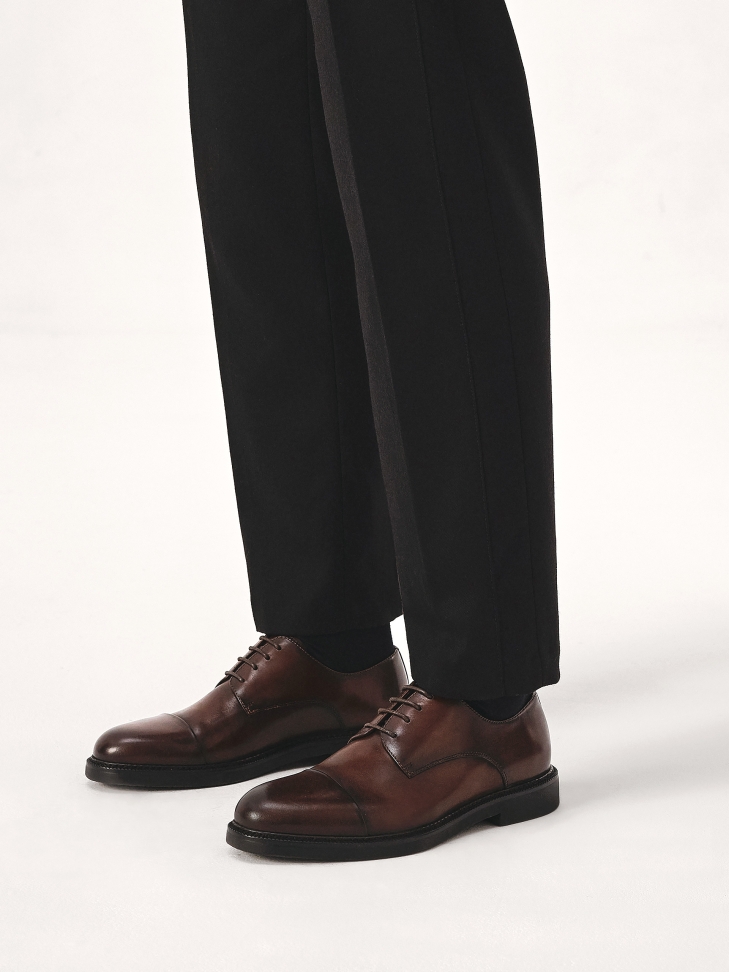 Brown suit shoes with cap toe nose