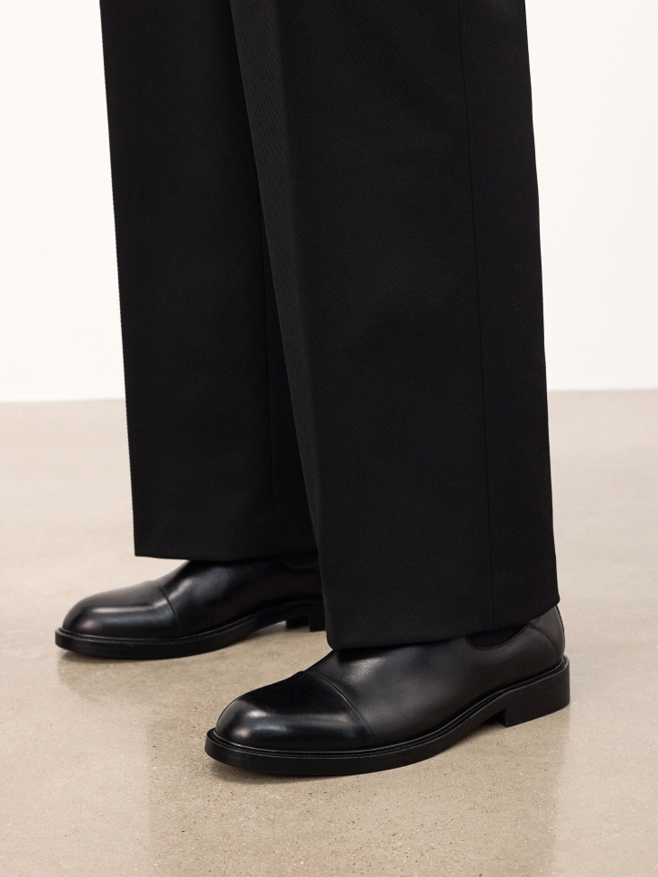 Black leather Chelsea boots