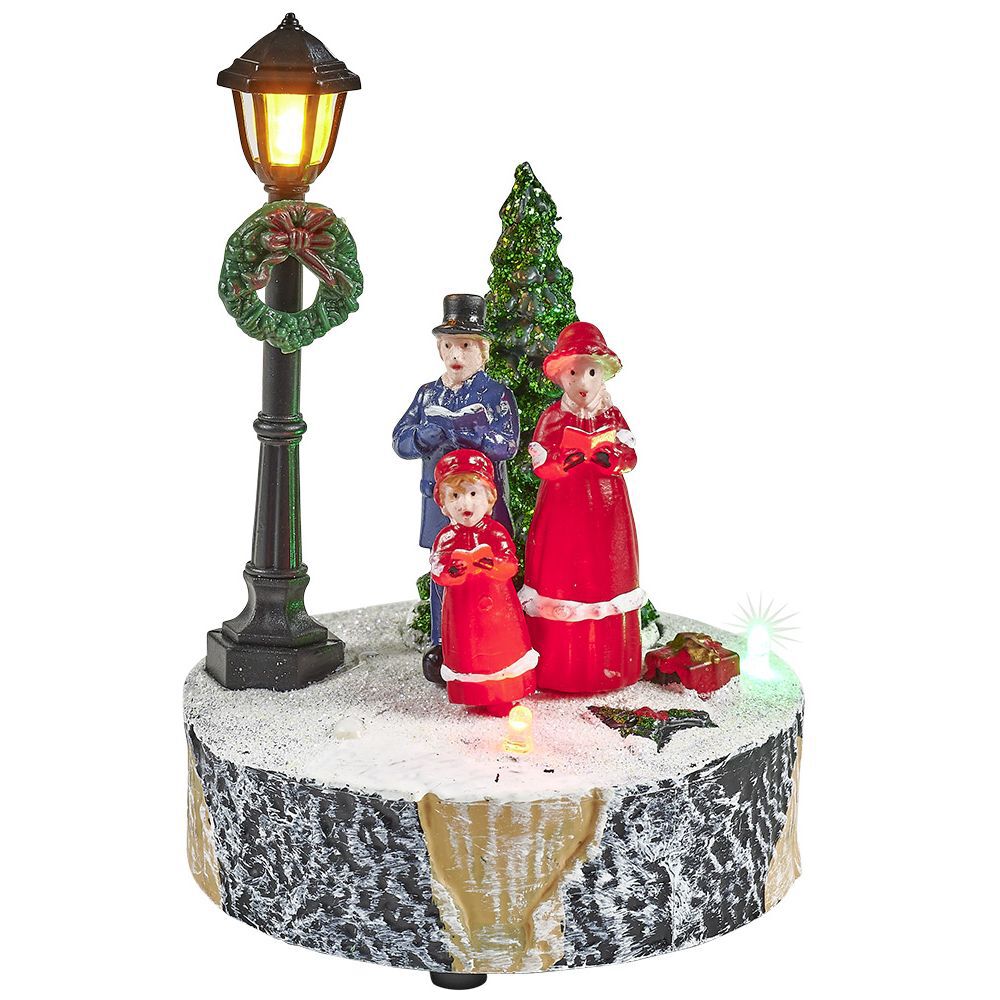 Scène village de No&euml;l avec lanterne lumineuse