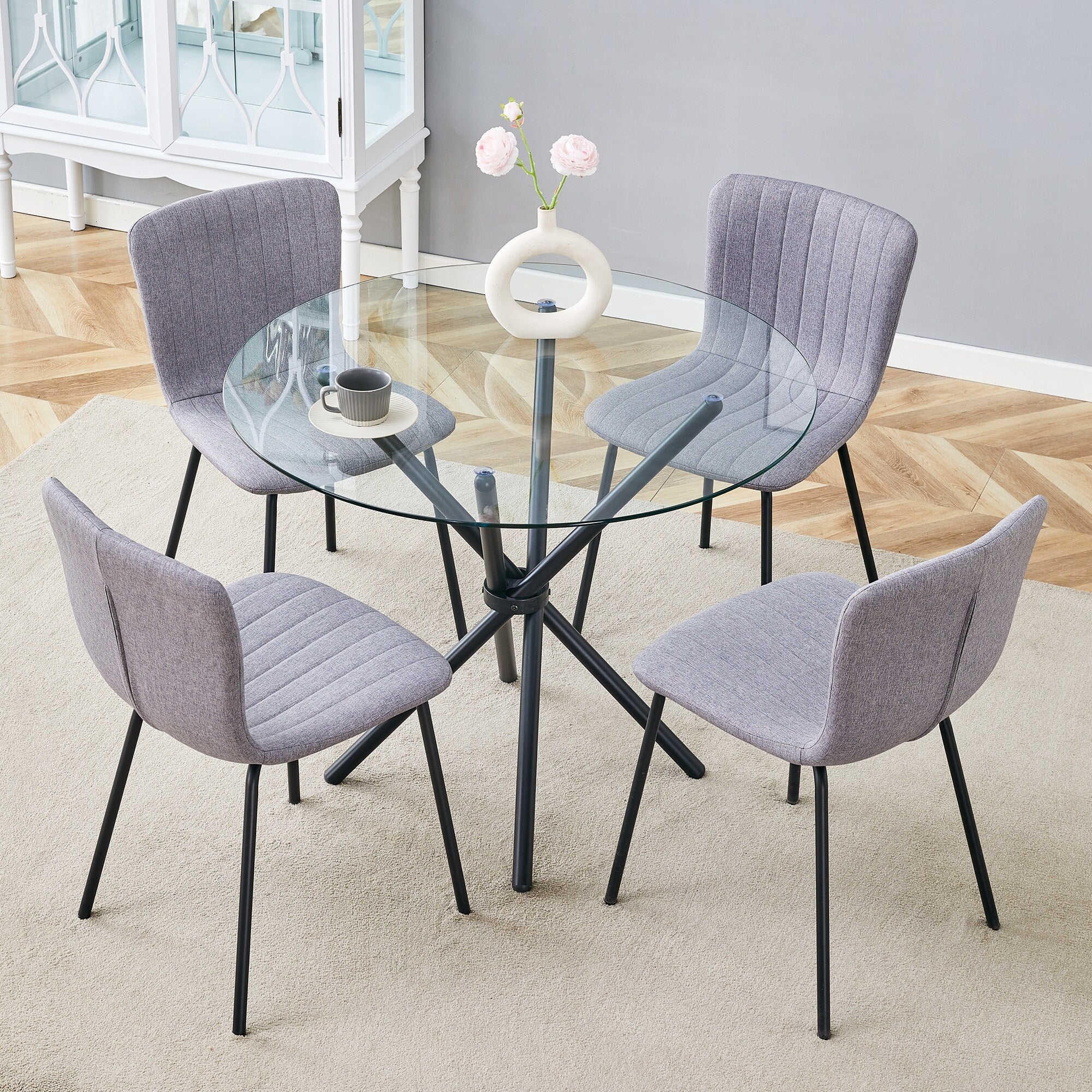 Table and chair set.A Transparent Tempered Glass Round Table.Paired with 4 transparent dining chair,Integrated backrest cushion.