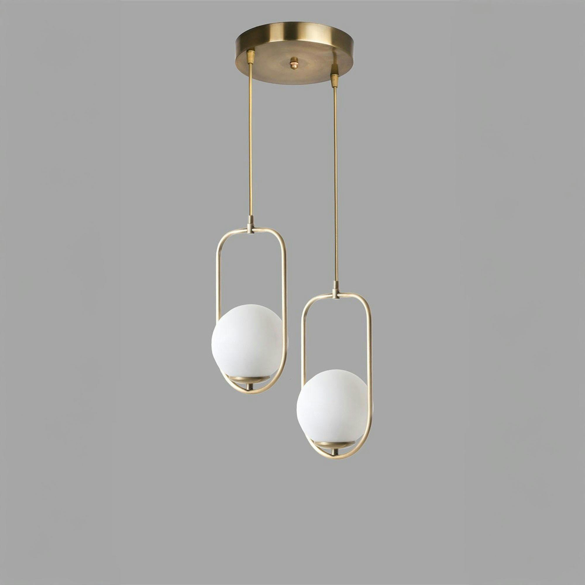 Suspension design dorée 2 globes blancs sur cadres SIERRE