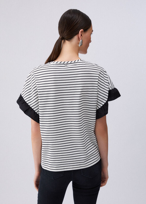 Top a righe con bottoni gioiello