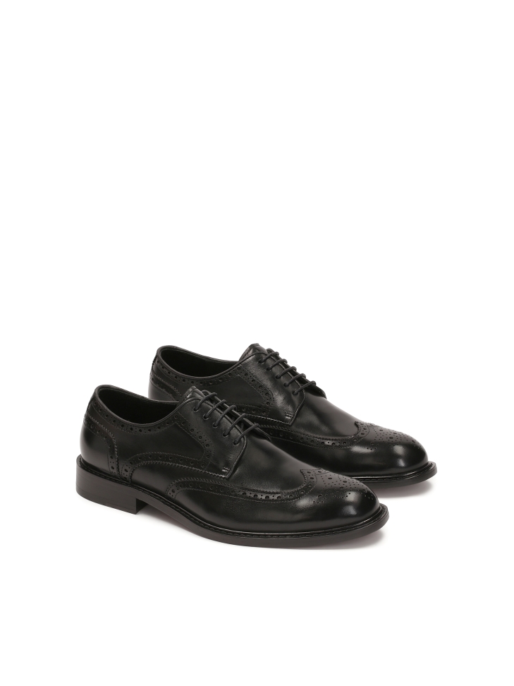Black elegant brogue-style shoes