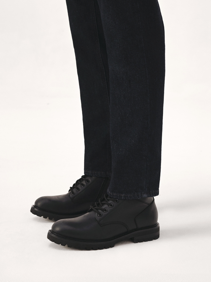 Black waterproof leather boots