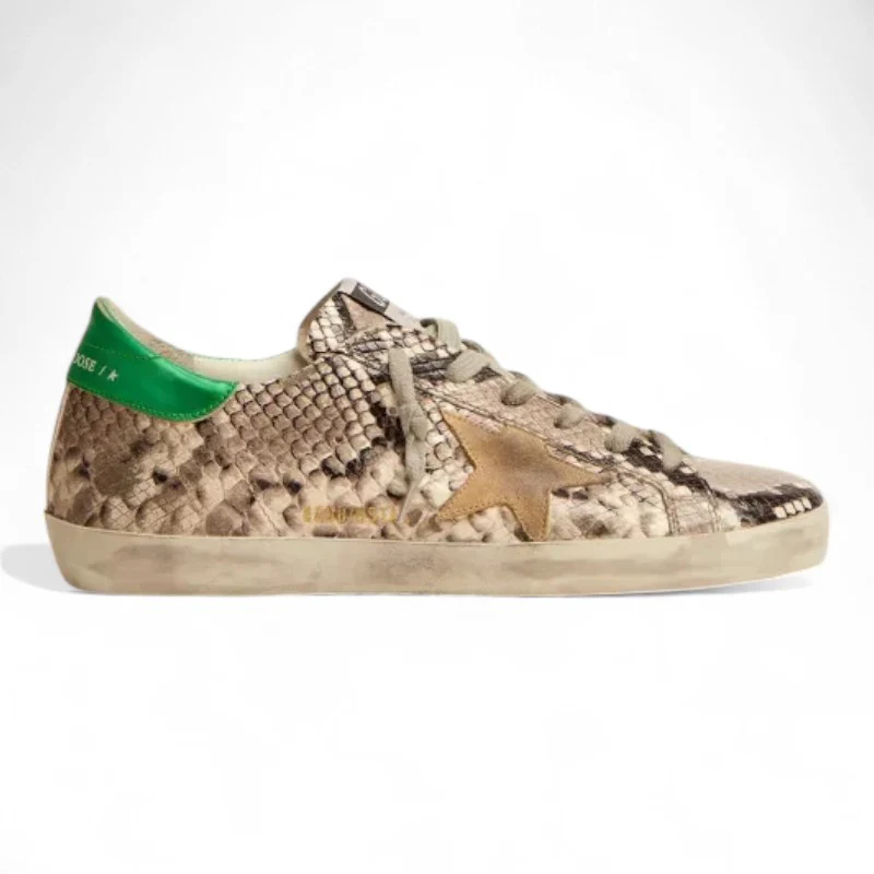 The Super-Star LTD sneakers feature a snake-print leather upper paired with a green laminated leather heel tab