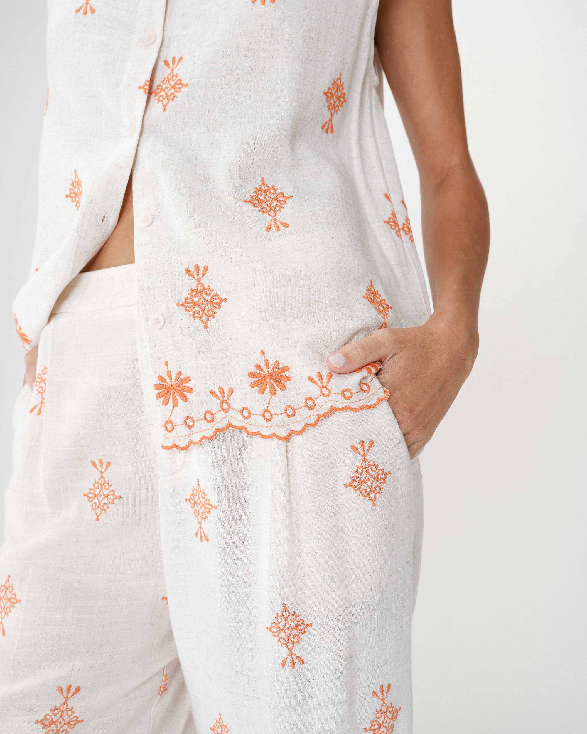 Chemise sans manches à motifs orange Wisenna