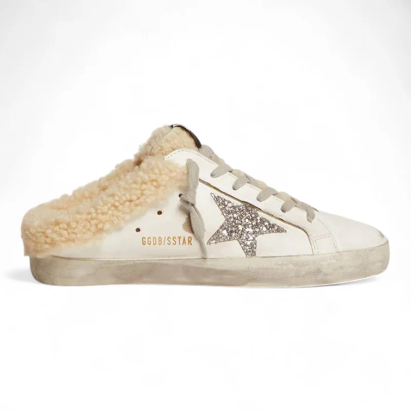 The Super-Star Sabot in white leather with shearling lining