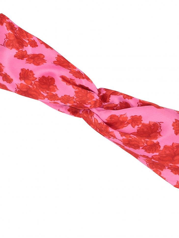 Pink headband with red flowers