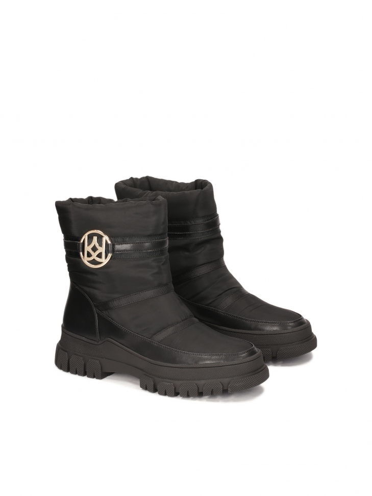 Black monogrammed snow boots