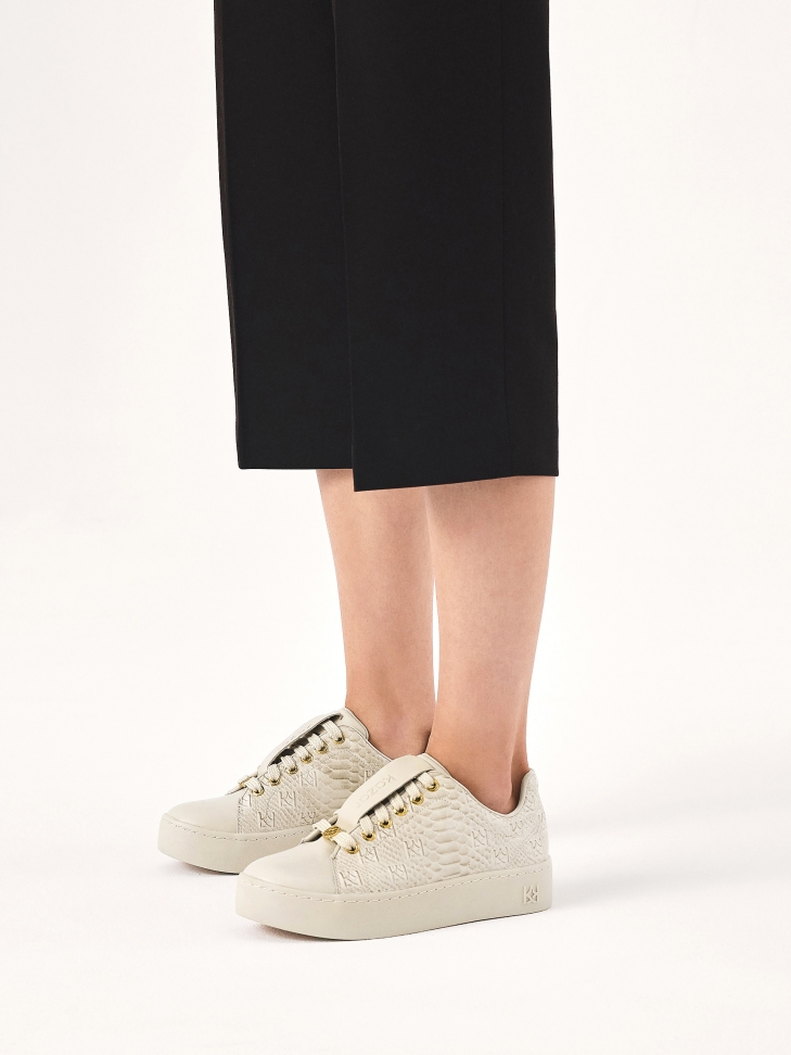 Comfortable leather sneakers with embossed pattern