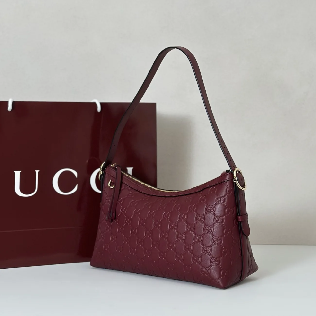 Gucci GG Emblem Medium Shoulder Bag in Leather