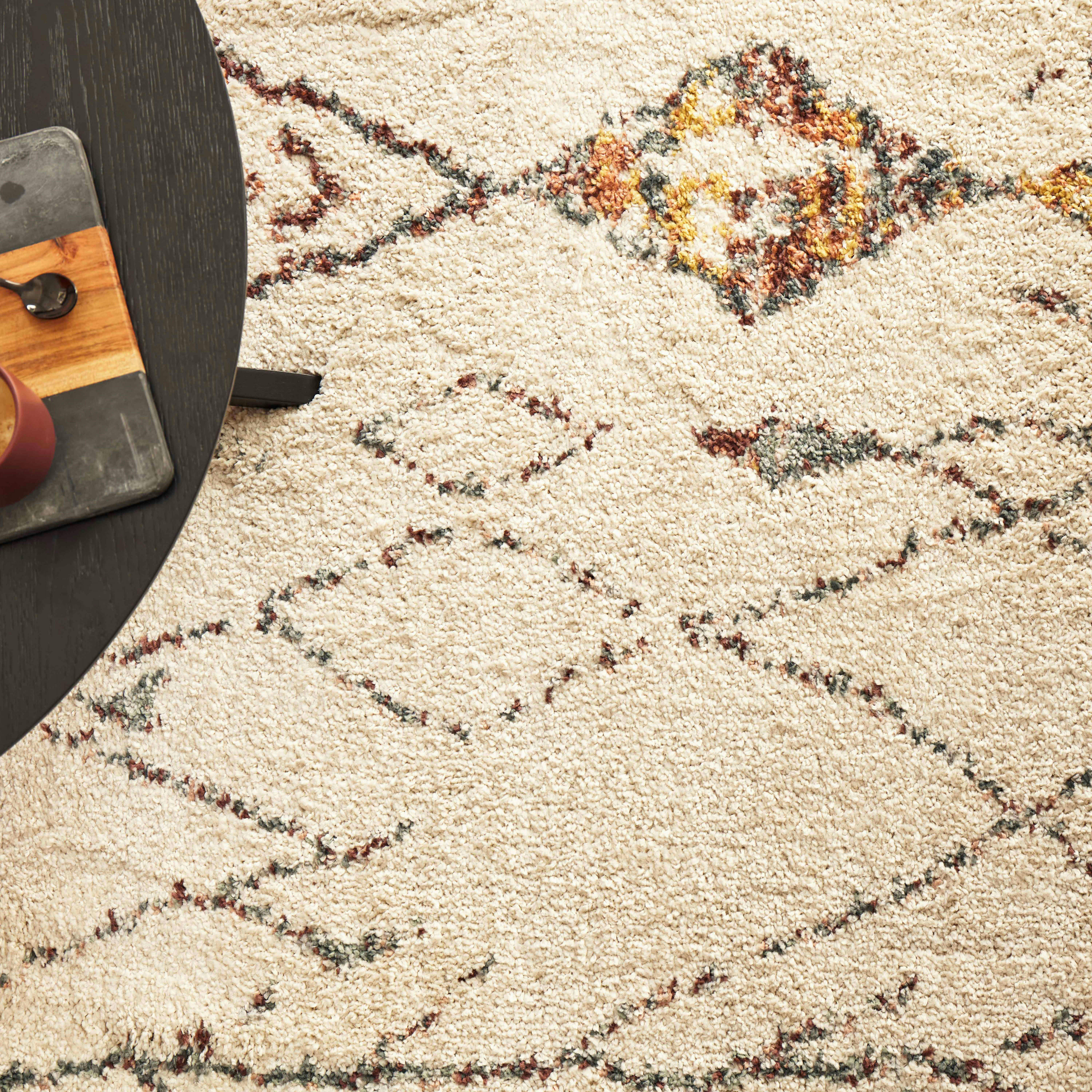 CALISTA - Tapis rectangulaire en polypropylène motif ethnique 120 x 170 cm