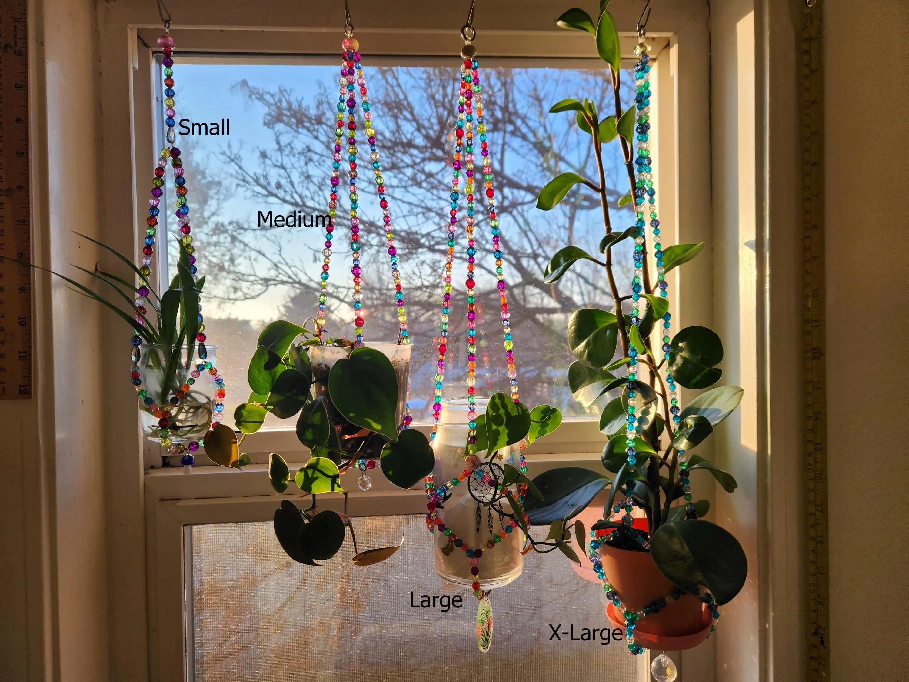 Unique handmade bead plant hangers for small pots and propagations.