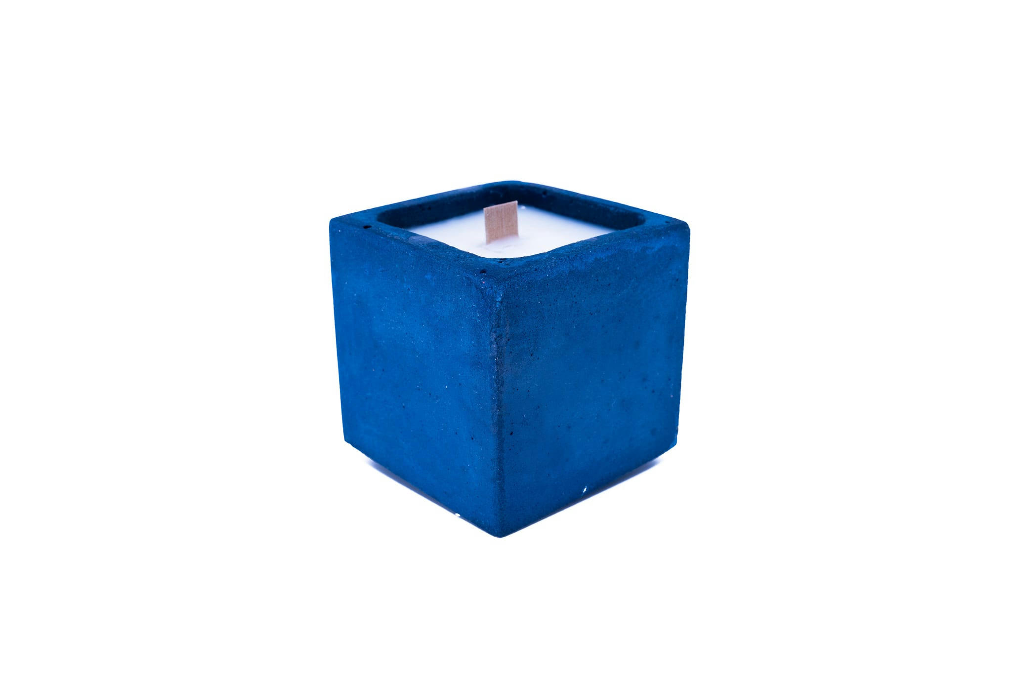 MONOÏ - Bougie en béton coloré bleu fleur de monoï