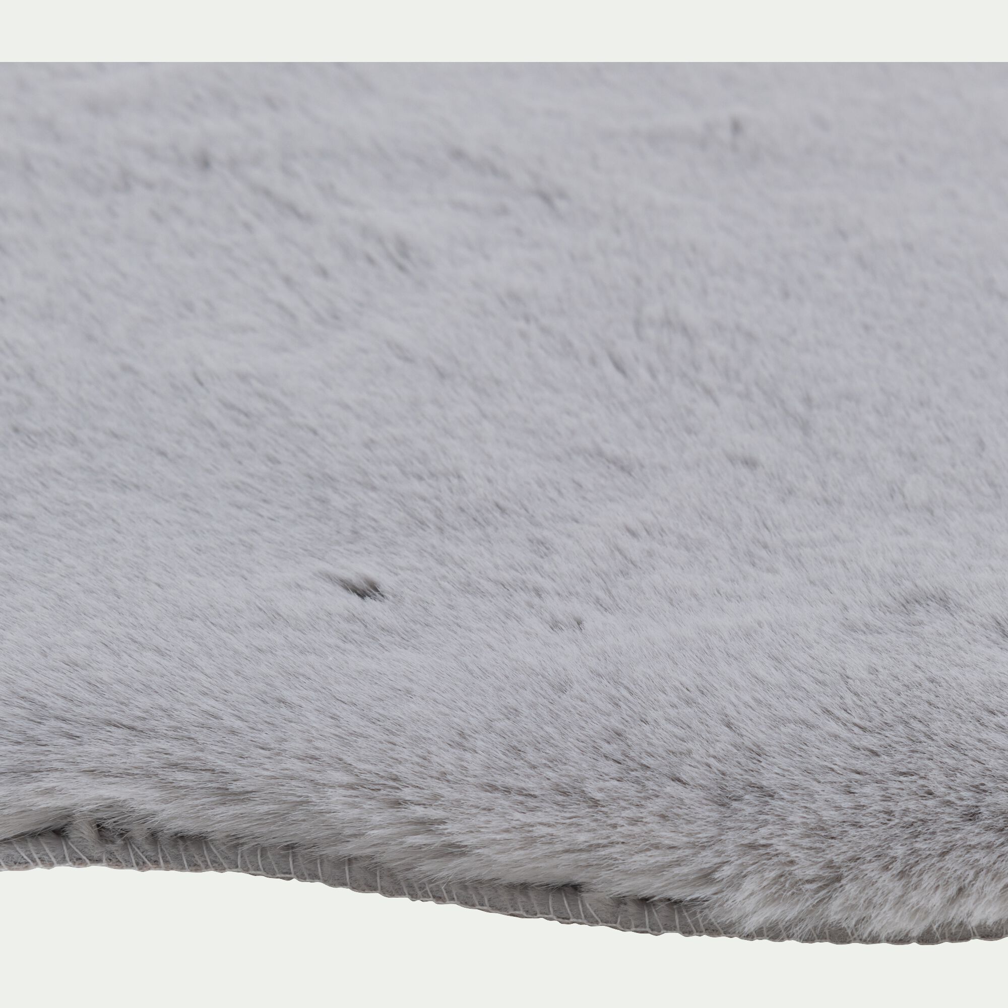 JOUVE - Tapis imitation fourrure - gris 60x90cm